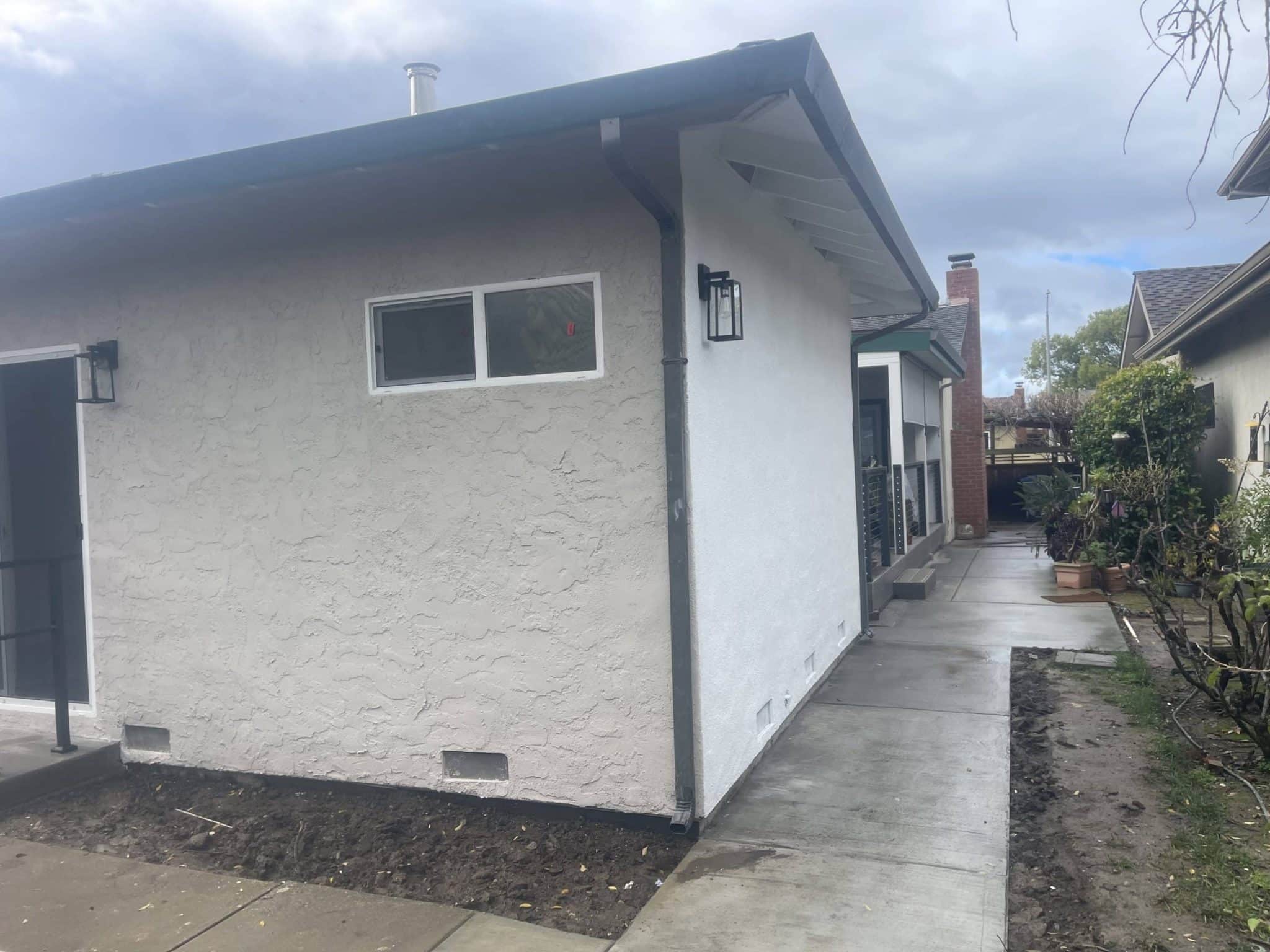 Finished stucco room addition on a Sunnyvale house